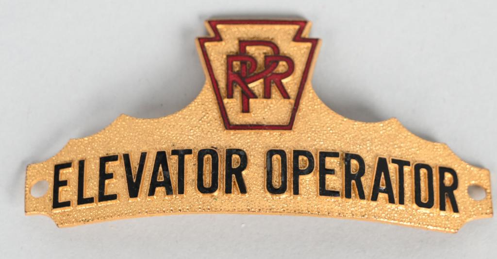 Pennsylvania Railroad Elevator Operator Hat Badge: brass enameled hat badge is in excellent condition, marked Willard Co.