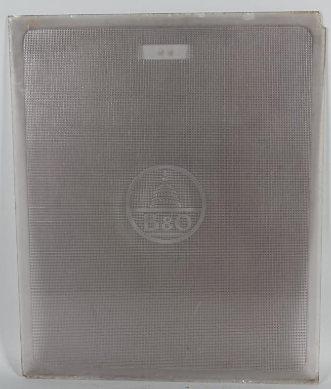 B&O Railroad Plate Door Glass: rated 8, 29"x24", glass has B&O and stippling design in the glass, has chips at corners. We will not ship this item.