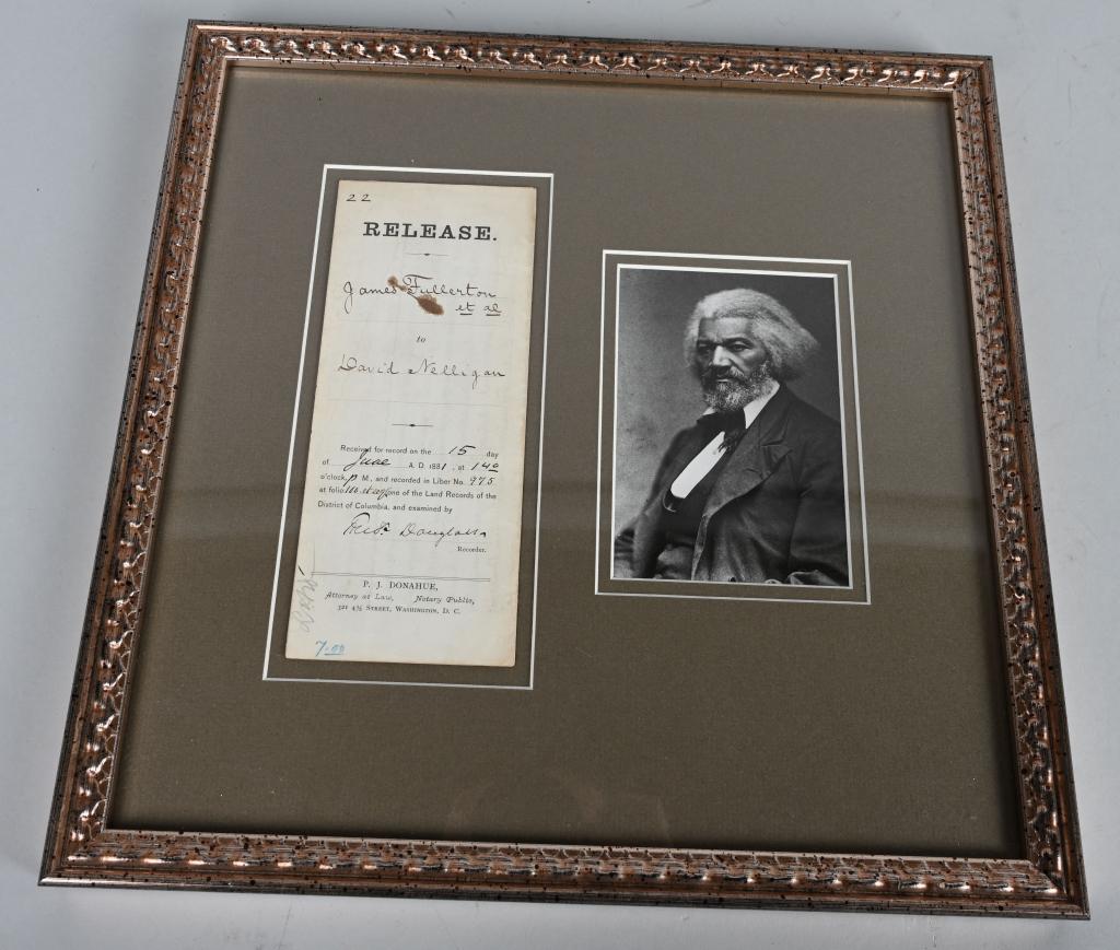 FREDRICK DOUGLAS SIGNED 1881 LAND RELEASE: Dated June 15, 1881 Land Release signed by Frederick Douglas and recorded in Land Office of the District of Columbia. Douglas was an American Abolitionist, Writer, and Lecture. He escaped slavery in 1