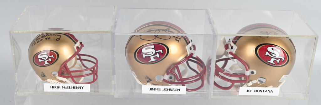 3- 49ers HALL OF FAMERS SIGNED MINI HELMETS: Includes Hugh McElhenny 49ers Hall of Fame Class of 1970, Jimmie Johnson 49ers Hall of Fame Class of 1994, and Joe Montana 49ers Hall of Fame Class of 2000. Signed on 49ers Mini Helmets. All with acry