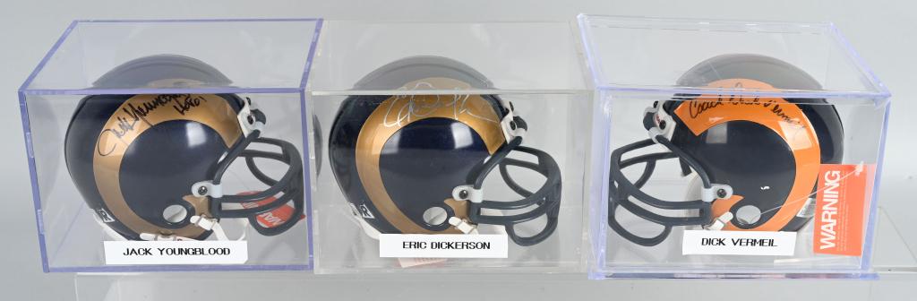 3- RAMS HALL OF FAMERS SIGNED MINI HELMETS: Includes Eric Dickerson Rams Hall of Fame Class of 1999, Jack Youngblood Rams Hall of Fame Class of 2001, and Dick Vermeil. Signed on Rams Mini Helmets. All with acrylic cases.