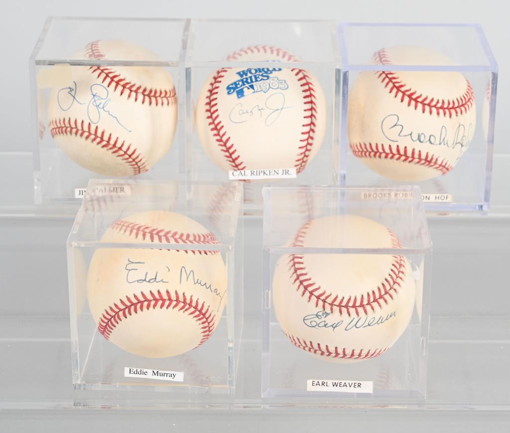 5- ORIOLES HALL OF FAMER SIGNED BASEBALLS: Includes Cal Ripkin Jr, Eddie Murry, Jim Palmer, Brooks Robinson, and Earl Weaver. All signed on Rawlings Baseballs. All with acrylic cases.