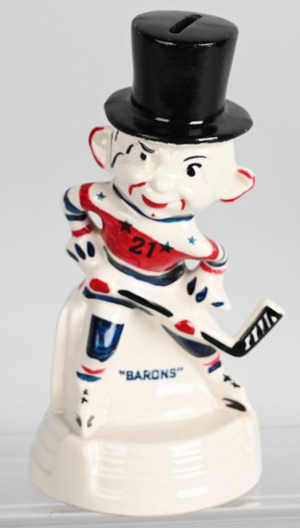 RARE STANFORD POTTERY CLEVELAND BARONS BANK: One of the harder to find banks made for the old Cleveland Barons hockey team of the old AHL. Armed with a stick and a top hat and stands about 9.5" tall. Stellar condition , great paint, not marked o