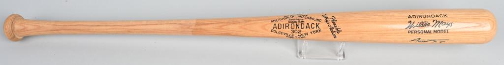 WILLIE MAYS SIGNED BASEBALL BAT: Full size 1950' style signature model bat signed by Mays in blue sharpie. Near mint.