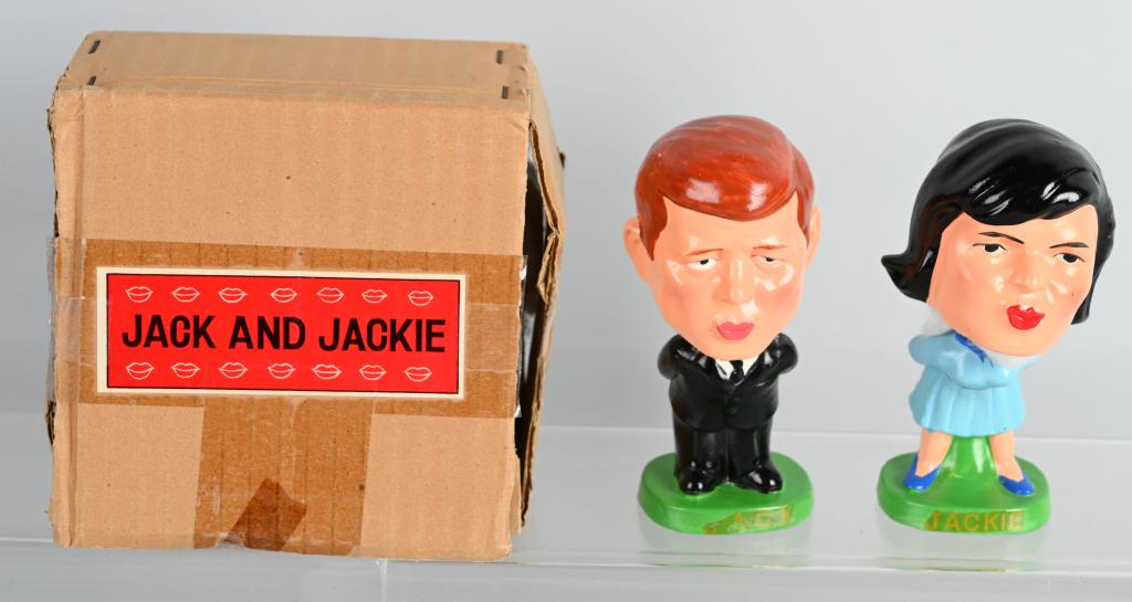 RARE BOXED "JACK & JACKIE " KISSING BOBBING HEADS: Here's a very rare set of kissing pair bobbing heads of Jack & Jackie Kennedy. They measure about 5.25" tall. Both dolls are in near-mint to mint as new condition in their original marked box. Made in