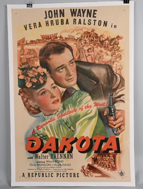 1945 DAKOTA, JOHN WAYNE MOVIE POSTER: Nice one sheet (27" by 41") movie poster mounted on linen. Starring John Wayne, Vera Ralston, and Walter Brennan. Great colors and graphics. Excellent