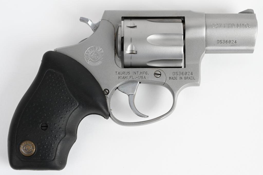 TAURUS .327 FED. MAG STAINLESS REVOLVER: SERIAL DS36824. BARREL 2". CALIBER .327 FEDERAL MAGNUM. Stainless 6-shot double action pocket revolver with rubber finger groove grips. Cylinder shows light face burn and gun has a couple of handling 