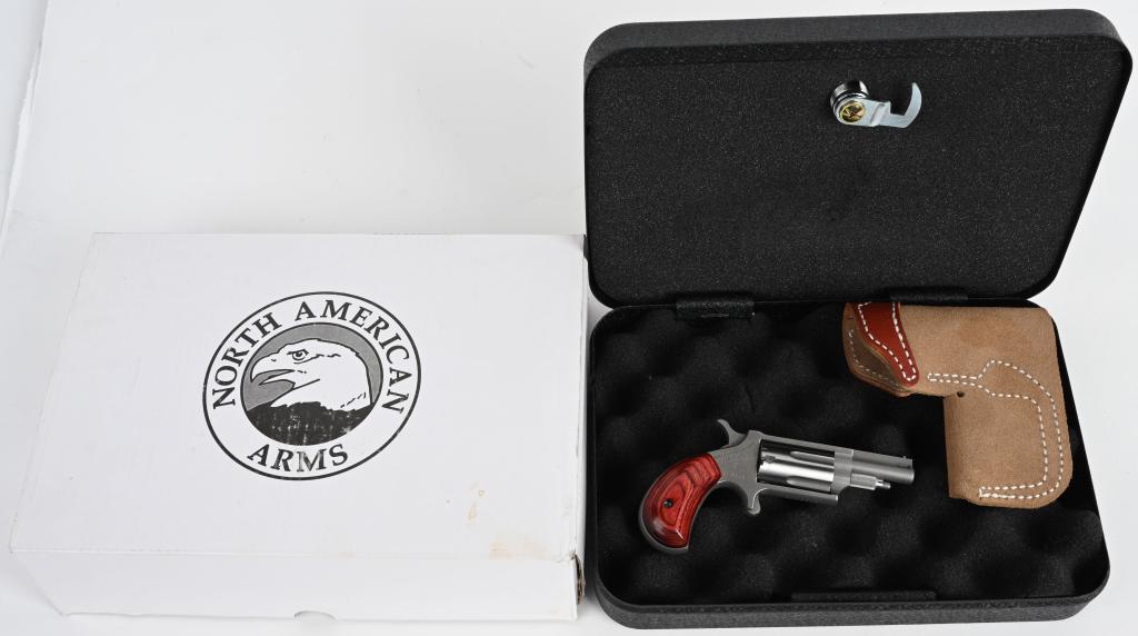 NORTH AMERICAN ARMS .22 MAGNUM DERRINGER: SERIAL PT09629. BARREL 1.5". CALIBER .22 RIMFIRE MAGNUM. This is a minute 5-shot single action , spur trigger, stainless, birds head wood grips made in Provo UT. Unfired with light handling and comes 