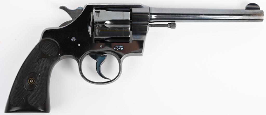 COLT ARMY SPECIAL 32-20 DOUBLE ACTION REVOLVER: SERIAL NUMBER 351 976, BARREL, 6" CALIBER 32-20 WCF, MANUFACTURED 1913. Blue finished with checkered hard rubber grips with Colt legend at top with stylized "C" at center. Very fine condition with exc