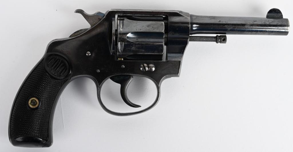 EARLY HIGH POLISH POLICE POSITIVE REVOLVER- 1907: SERIAL 50302. BARREL 3.5". CALIBER .32 POLICE. MADE IN 1907, 1ST YEAR PRODUCTION. This fine little pocket gun features a six shot fluted cylinder, Colt factory high polish blue finish with fire blue s