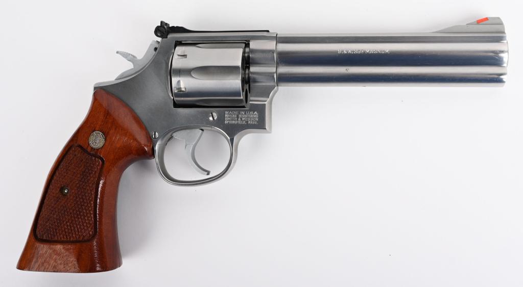 SMITH & WESSON MODEL 686-3 REVOLVER: SERIAL BFS5792. BARREL 6". CALIBER .357 MAGNUM. Referred to as the Distinguished Combat Magnum Stainless. Built on L-Frame, 3-screw, square butt beginning in 1980. Features full under lug, solid rib,