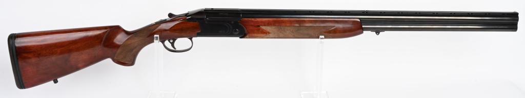 VALMET 412S OVER UNDER 12 GA SHOTGUN: SERIAL NUMER 256656 BARRELLS 18" CALIBER 12GA 2-3/4" MANUFACTURED FINLAND BY VALMET. Blue finished over under with single selective trigger and cocking indicators and ejectors. Straight grained Europe