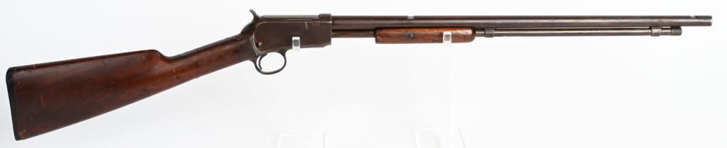 WINCHESTER MODEL 1906 SLIDE ACTION .22 RIFLE: SERIAL 164996. BARREL 20". CALIBER 22 RIMFIRE (ALL) MADE IN 1909. Classic slide action short barrel rifle. Features round barrel, tube magazine, take down, walnut stocks with Winchester gutta percha b