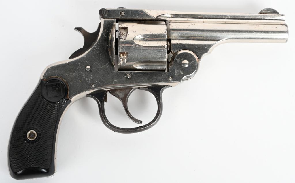 FINE H&R AUTO EJECT TOP BREAK 32 S&W REVOLVER: SERIAL 158573. BARREL 3 1/4". CALIBER .32 S&W . Features factory nickel finish with blue trigger guard and monogram gutta percha grips. Solid 90% finish gun with good rifling and tight action. Grips n