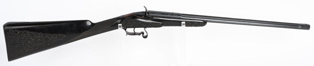 RARE CARVED EBONY STOCKED FLOBERT RIFLE: NSN. BARREL 19". CALIBER .22 RF SMOOTHBORE. This is a Royal grade rifle that features solid gold crown & lions on trigger guard. The blue barrel is fluted with engraving at breech & muzzle. The stock