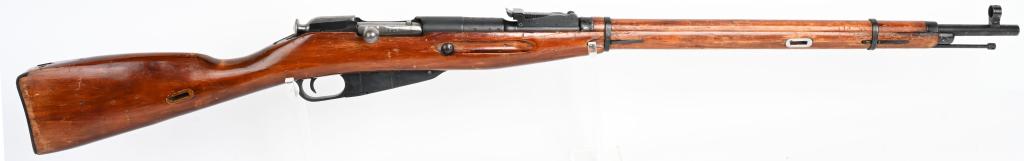 WW2 RUSSIAN 91/30 MOSIN NAGANT BY IZHEVSKS: SERIAL NUMBER BA6722, BARREL 29" CALIBER 7.62X54R, MANUFACTURED 1940. Produced in the Soviet Republic by Izhevsks Arsenal. Round receiver with 2000 yard slide adjustable rear sight. Two piece wood sto
