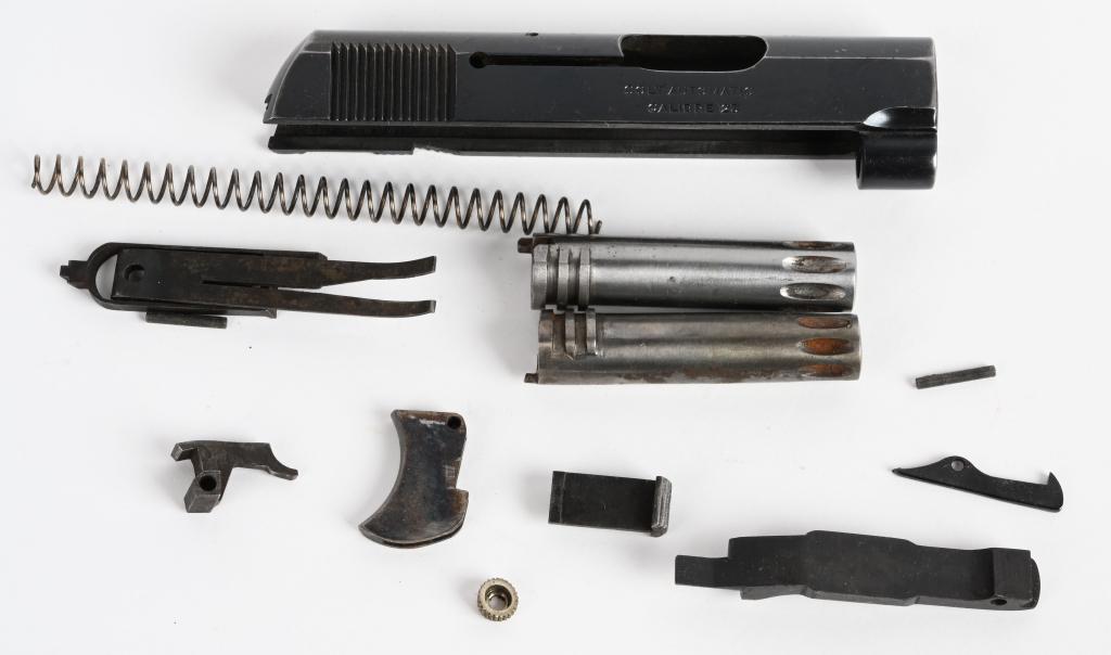 LOT OF COLT 1908 .25 ACP PARTS / SLIDE: Slide is serial #306140 made in 1922 retaining 85 % original Colt blue. Also includes two barrels, spring, trigger and small parts.