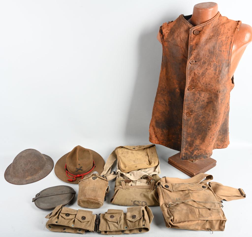 WW1 LARGE LOT OF WW1 US ARMY FIELD GEAR MESS KITS: Large lot of WW1 US Army field gear including 1) U.S. WWI gas mask. Complete with canister and carrying bag with shoulder strap size marked 3. 2) WWI canteen, cup and cover. Marked A. J. Bates Co. 1- 