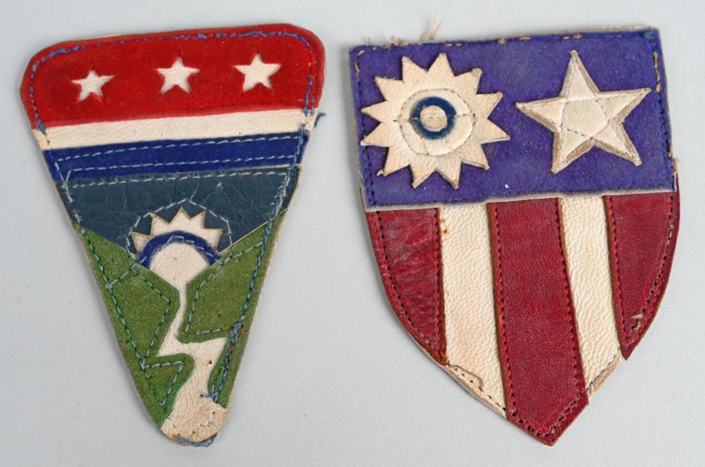 WWII LEATHER THEATER MADE LEDO ROAD CBI PATCH LOT: WWII US Army China Burma India and Ledo Road Leather shoulder patch lot. Both patches are multi piece construction and in excellent condition. The Ledo Road was built by U.S. Army Engineers and native