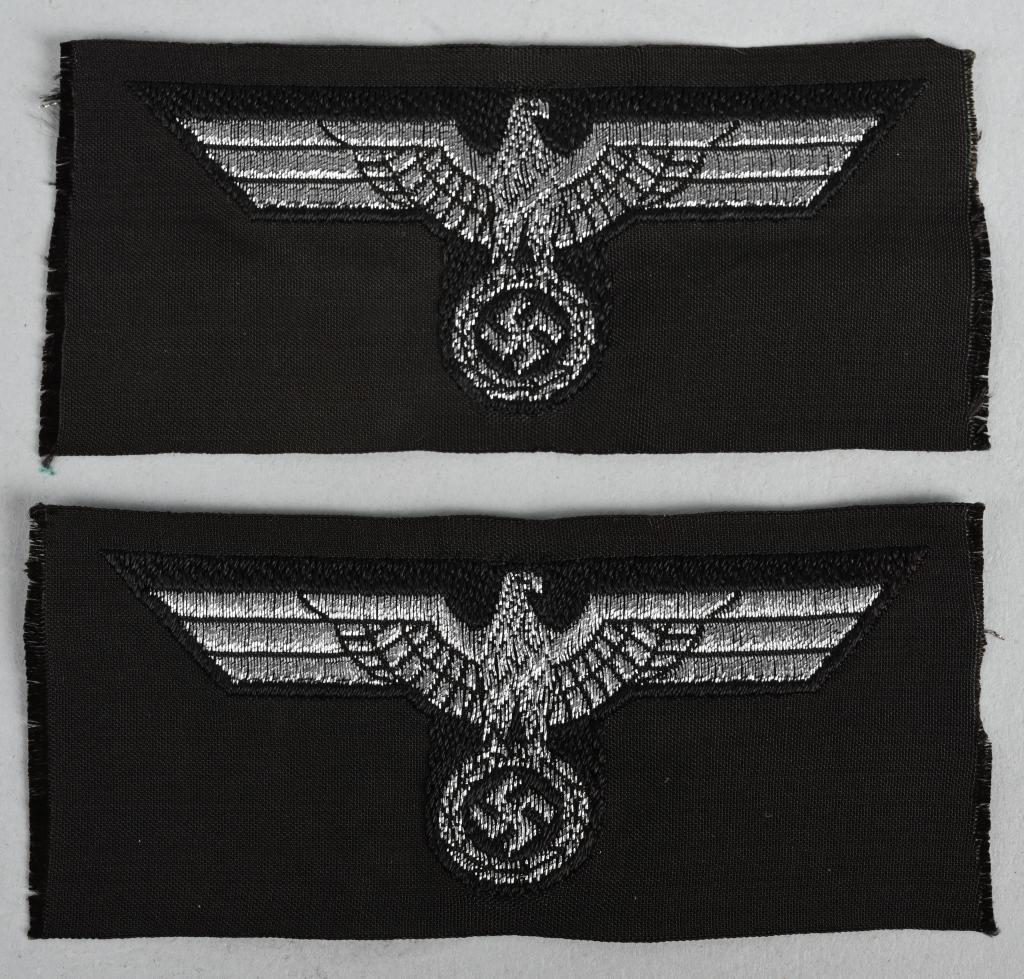 WW2 NAZI GERMAN PANZER OFFICER FLAT WIRE CAP EAGLE: PANZER OFFICER FLAT WIRE OVERSEAS / M43 CAP EAGLE LOT OF TWO. Machine woven national eagle in silver flat wire threads on a woven black rayon base. Both eagles are mint! The German army originally ado