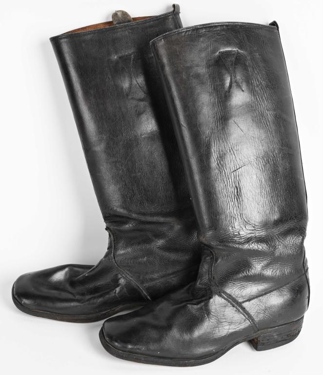 WWII NAZI GERMAN OFFICERS BOOTS: Superb quality tall blackened leather construction boots are roughly 48cm tall from the top of the heel to the top of the back calf section. The boots have a machine stitched central vertical seam to