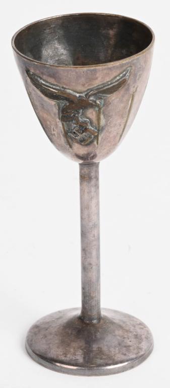 WWII NAZI GERMAN LUFTWAFFE MINITURE GOBLET: Small sized silver goblet with a long stem. Possibly a shot glass sort of miniature of the Honor Goblet. Has Luftwaffe eagle applied to the cup portion. Unsigned. Measures approximately 4" Shows age a
