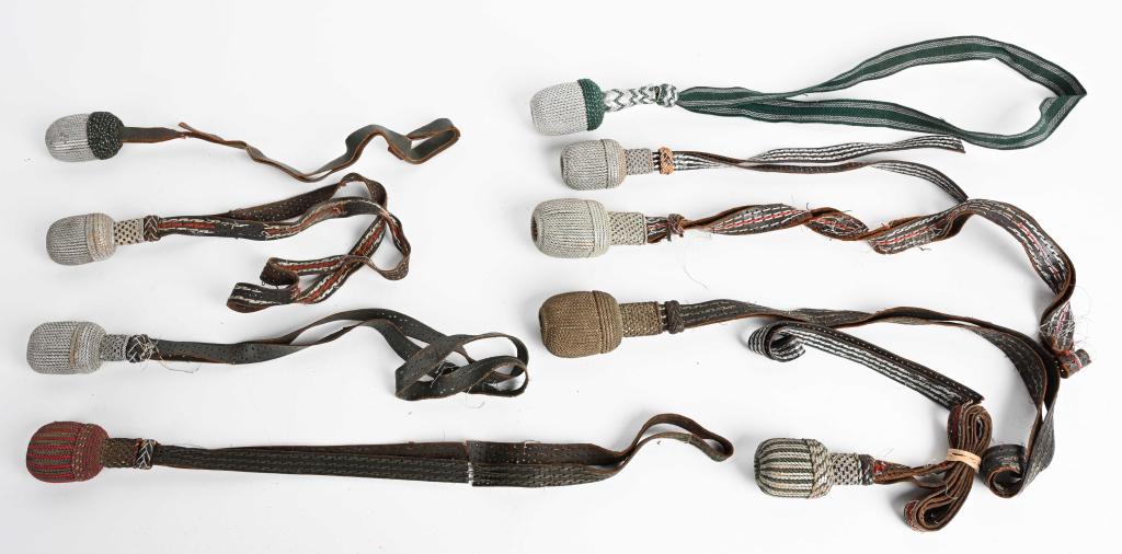 9 WWII NAZI GERMAN DAGGER, BAYONET, SWORD KNOTS: Lot of 9 WWII Nazi German sword knots. Condition and color varies. Very Good - Excellent