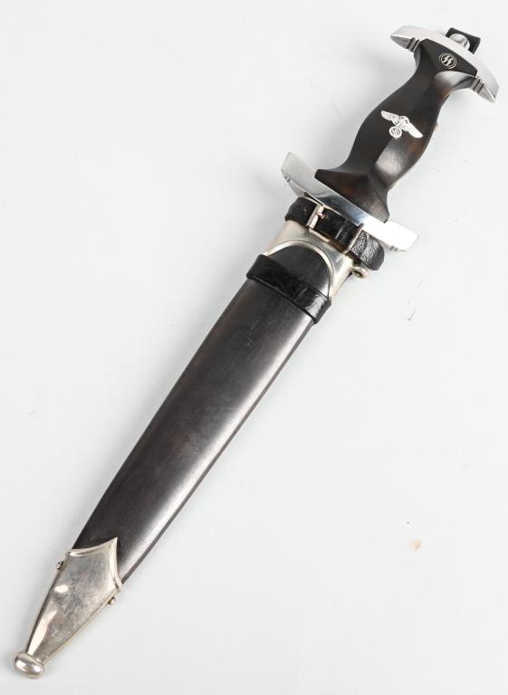 WWII NAZI GERMAN SS M33 SERVICE DAGGER W/ HANGER: Nice quality dagger features a roughly, 22cm long, double edged, drop forged steel construction, nickel/silver plated blade with a low central ridge. The nickel/silver plated blade is in nice conditio