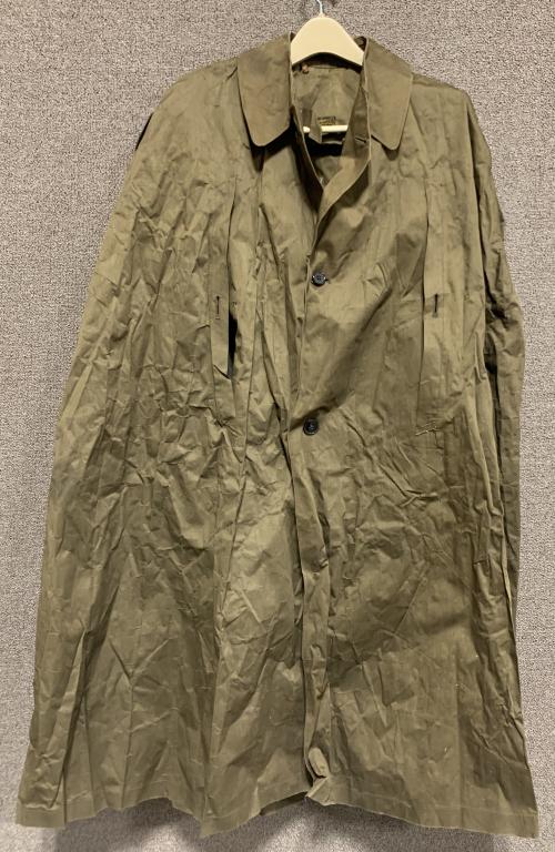 WWII NAZI GERMAN HITLER YOUTH RAIN CAPE PONCHO WW2: Rare Hitler Youth foul weather poncho, rich brown cloth with an oil cloth backing, 45" long from the top of the collar to the end of the jacket. Three smooth brown composite buttons held with miniatur