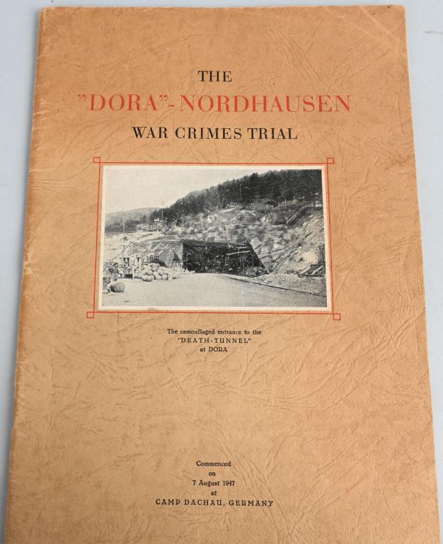 WWII NAZI DORA NORDHAUSEN WAR CRIMES TRIAL BOOK: This item is a great 64 page staple bound book/report on the "DORA" - Nordhausen War Crimes Trials held at Camp Dachau, Germany. The book was published in 1947 and was offered to readers by the Prosec