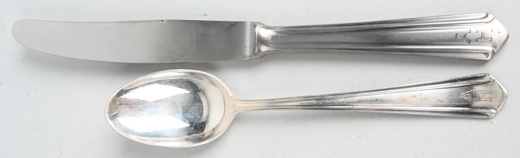 ADOLF HITLER SILVERWARE PERSONAL TABLE SERVICE: Adolf Hitler – Silverware from his Personal Table Service. Group of two pieces silverware, dinner knife and soup spoon with engraved initials “AH”. Stamped manufacturer marks WELLNER PATENT 90 4