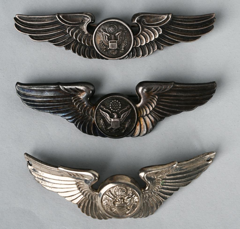 WWII US ARMY AIR CORPS 3 INCH WINGS AIR CREW: Lot of three WWII US Army Air Corps Air Crew wings in Sterling. One has been converted into a bracelet while another in maker marked to LBG.