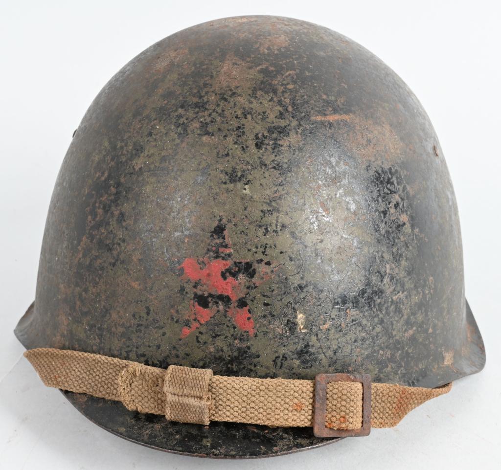 WWII SOVIET RUSSIAN BLACK PAINTED HELMET W/ STAR: Complete WWII Era Soviet black painted helmet with RED STAR applied to the front. Much of the star at this point has faded but it is very clear that is what it is. Helmet is complete with it's sever f
