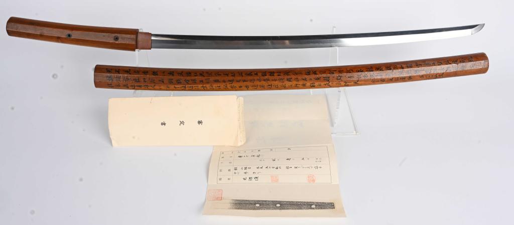 JAPANESE ECHIZEN TSUGUHIRO KATANA w/ LETTER: Very nice Katana with letter attributed to Echizen Tsuguhiro from Genroku period. 32 1/2" bright blade with 25 9/16" cutting edge. The blade has a visible straight hamon. Fetures a 3 hole tang, and th