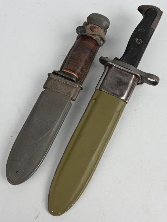 WWII USN FIGHTING KNIFE & M1 BAYONET LOT OF 2 WW2: WWII US edged weapon lot consisting of U.S.N. MK1 FIGHTING KNIFE. A fighting knife and scabbard with a 13cm blade that is well marked "USN" and "MARK 1". The knife’s alloy pommel is silver/ grey col