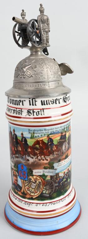 WW1 IMPERIAL GERMAN LIDDED STEIN 63rd ARTILLERY: Imperial German lidded Regimental stein of the 63rd Field Artillery Regiment of Frankfurt with a full roster of the company 1912-1914. Nice colors and detailed lid depicting a gun crew at their gun. S