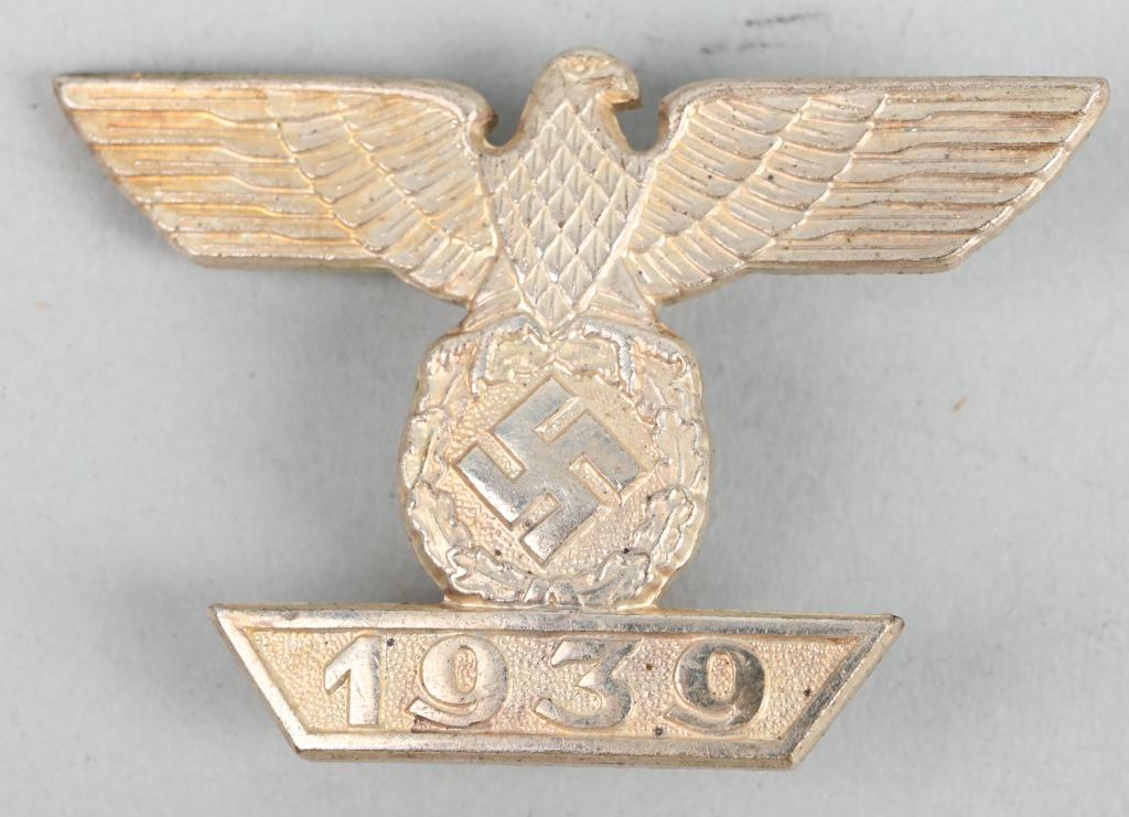 REPRO WWII NAZI GERMAN 1ST CLASS SPANGE L/21 WW2: Reproduction WWII Nazi German Spange. Nicely detailed, die struck alloy construction, second pattern, nickle/silver plated award is in the form of a national eagle with outstretched wings, clutching a