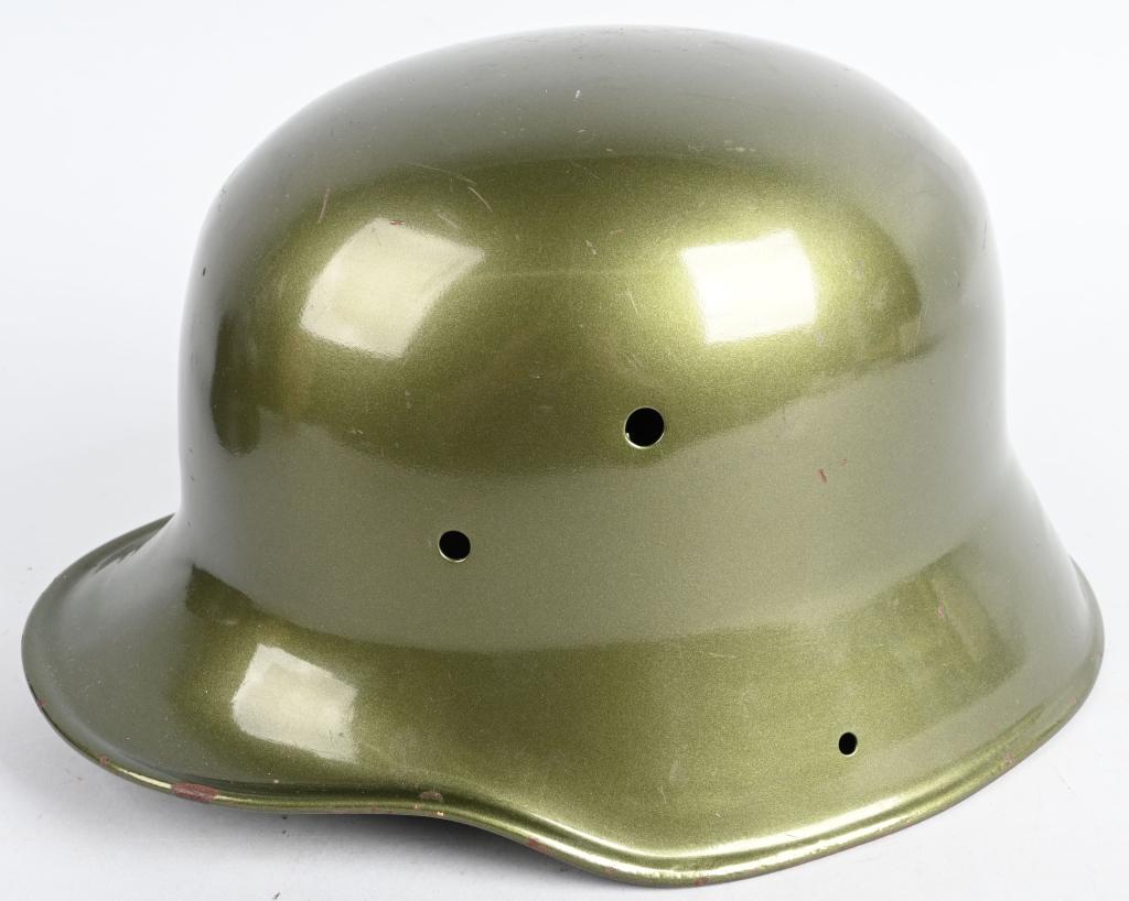 REPAINTED M18 GERMAN HELMET SHELL: M18 WWI era German helmet shell. Smooth glossy green finish is post-war. No bolts or liner. Shell only. Good restoration candidate. Very Good