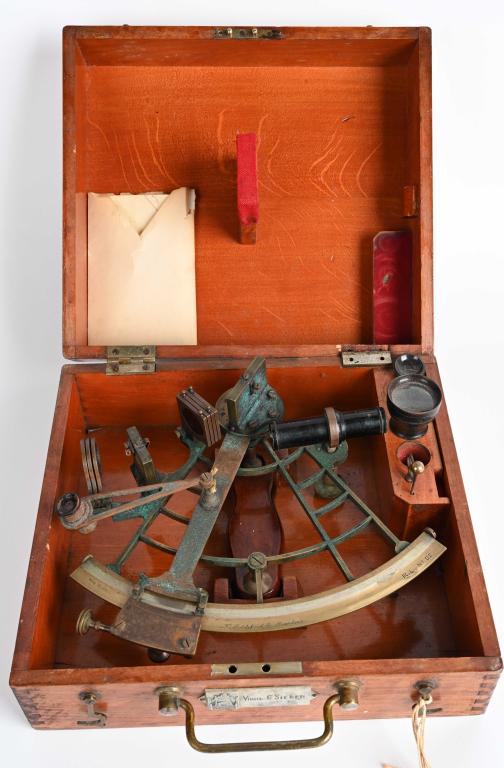 W. LUDOLPH MARINE SEXTANT IN CASE: WWII Era and in good condition. In original wooden case . Made by W. Ludolph, Bremerhaven, Hamburg. Case is 30X30X16 cm. made of wood. The sextant is metal and copper. A sextant is a doubly reflecting
