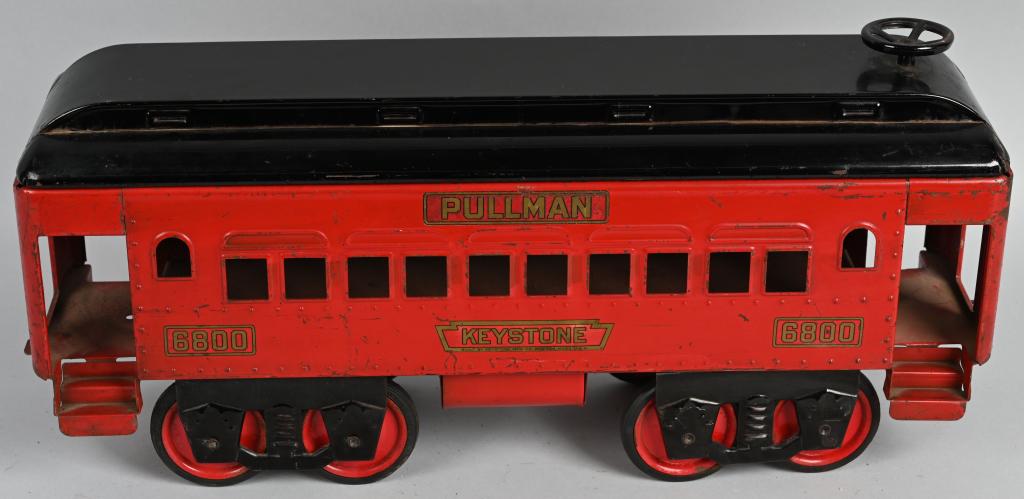 KEYSTONE PRESSED STEEL 6800 PULLMAN TRAIN CAR: Nice original Keystone 6800 Pullman Passenger Train Car. Very nice factory paint and decals. Has opening roof. Still has original steering wheel. This toy utilized the same body used on the Keystone B