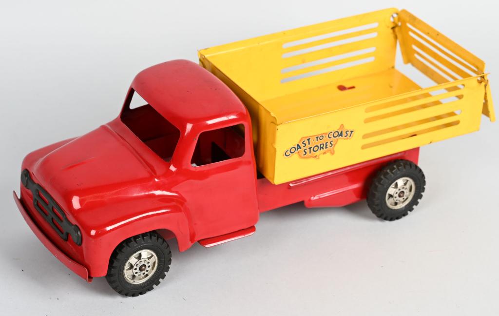 BUDDY L PRESSED STEEL COAST TO COAST STORES TRUCK: Nice original Buddy L Coast to Coast Stores Truck. All factory paint and decals. Looks never played with condition. 15" Excellent-Near Mint