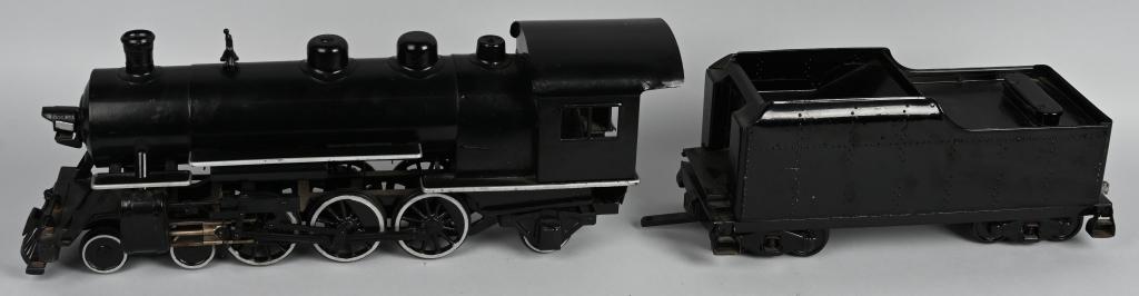 BUDDY L PRESSED STEEL TRAIN ENGINE & TENDER: Repainted Buddy L Railroad Train Engine and Tender. This piece has an amateur repaint. The Engine and Tender are both very solid condition. Engine 25" Tender 18" Very Good