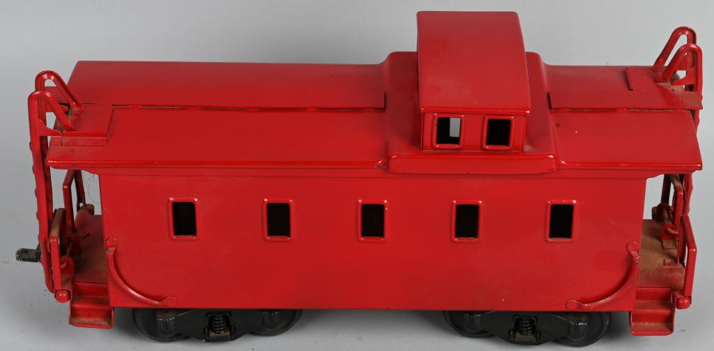 BUDDY L PRESSED STEEL CABOOSE: Repainted Buddy L Caboose. This is a decent amateur restoration. It was painted in a green and black scheme. The car is solid. Looks complete. 20" Very Good