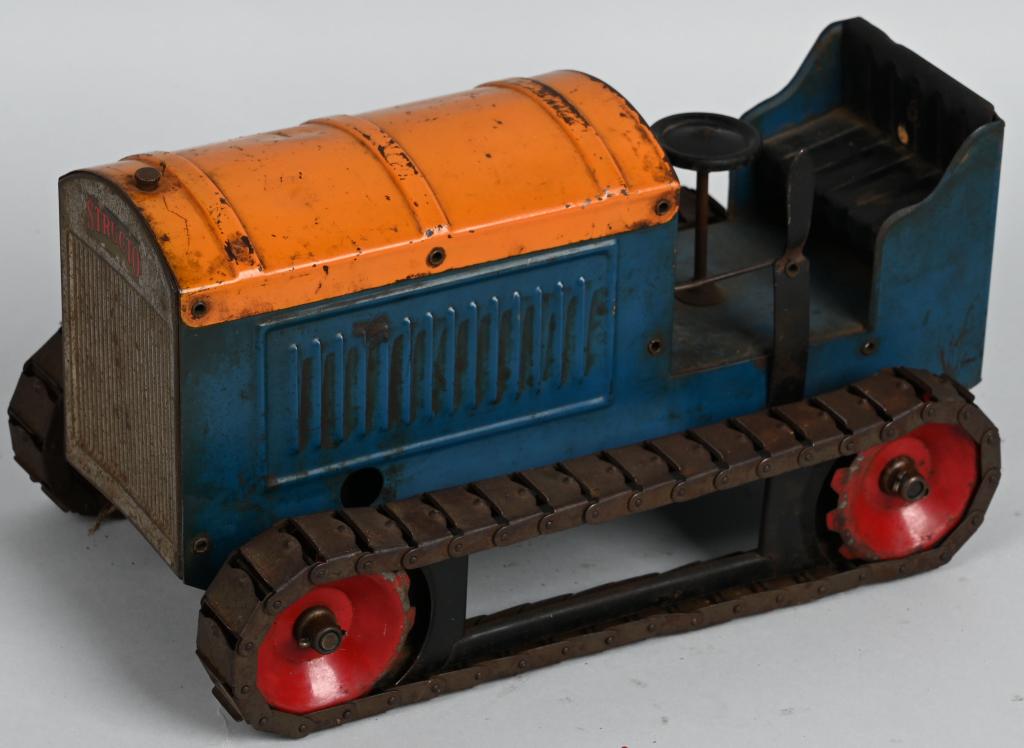 STRUCTO PRESSED STEEL CLOCKWORK TRACTOR: Original Structo clockwork Tractor. Has unusual hand crank winding mech. Works fine. All original condition. 12" Excellent