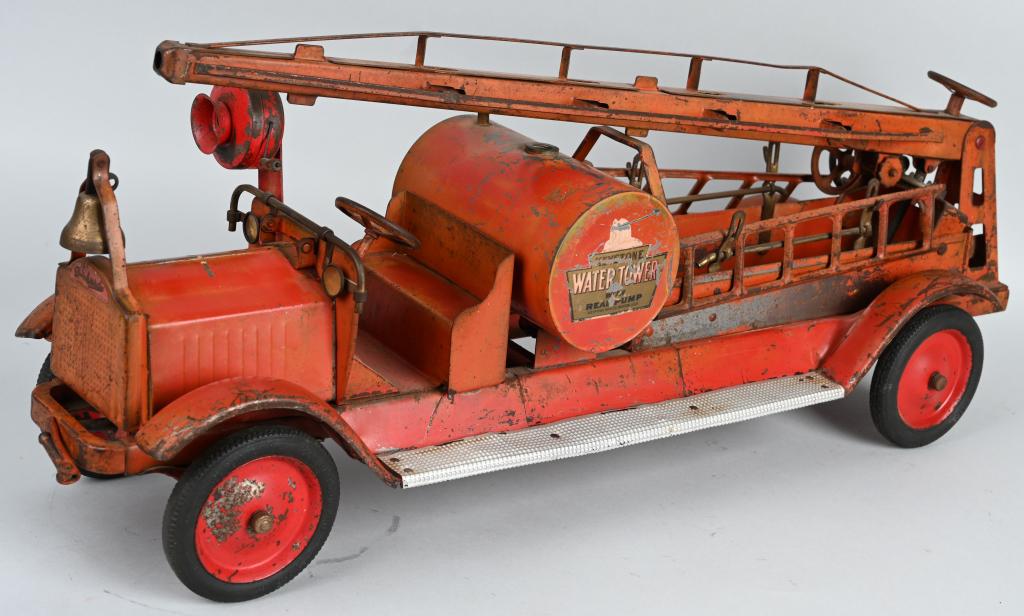 KEYSTONE PRESSED STEEL WATER TOWER FIRE TRUCK: Original Keystone Packard Water Tower Fire Truck. Original paint and decals show normal patina. Still has accessory ladders, bell, and siren. Displays very well. 32" Very Good