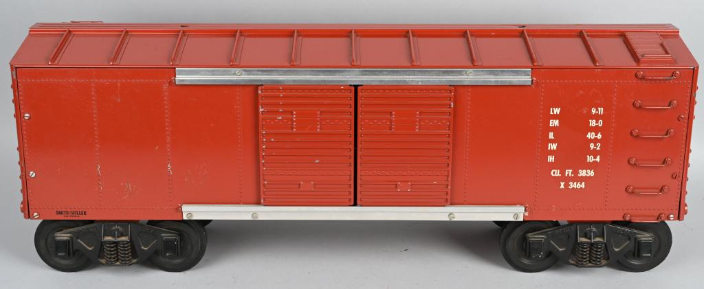 SMITH MILLER PRESSED STEEL TRAIN CAR TOY CHEST: Professionally restored Smith Miller Train Car Toy Chest. Very well done restoration. Top of the train car comes of for storage. Very nice details. 33" Excellent