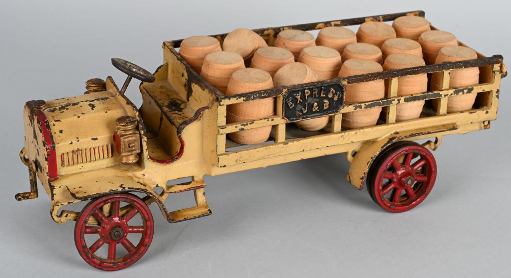 JONES & BIXLER CAST IRON J&B EXPRESS TRUCK: Original Jones & Bixler J&B Express Truck. Nice factory paint. Has tandem rear wheels. A very large and impressive cast iron toy. Comes with load of wooden barrels. 16" Very Good-Excellent