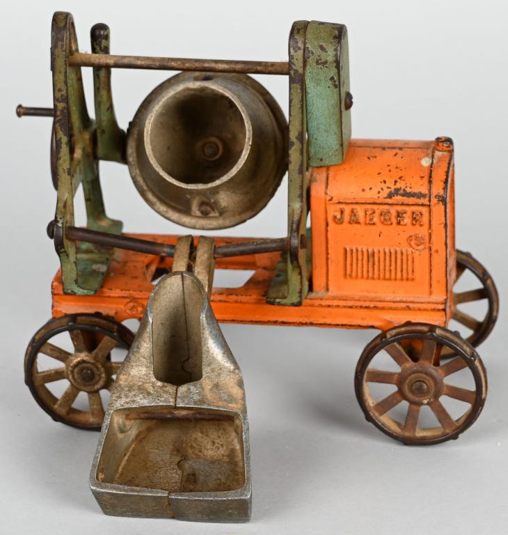 KENTON CAST IRON JAEGER CEMENT MIXER: Original Jaeger Cement Mixer. Has decent factory paint. Iron wheel version. Missing top crank. Very detailed toy. 7" Excellent