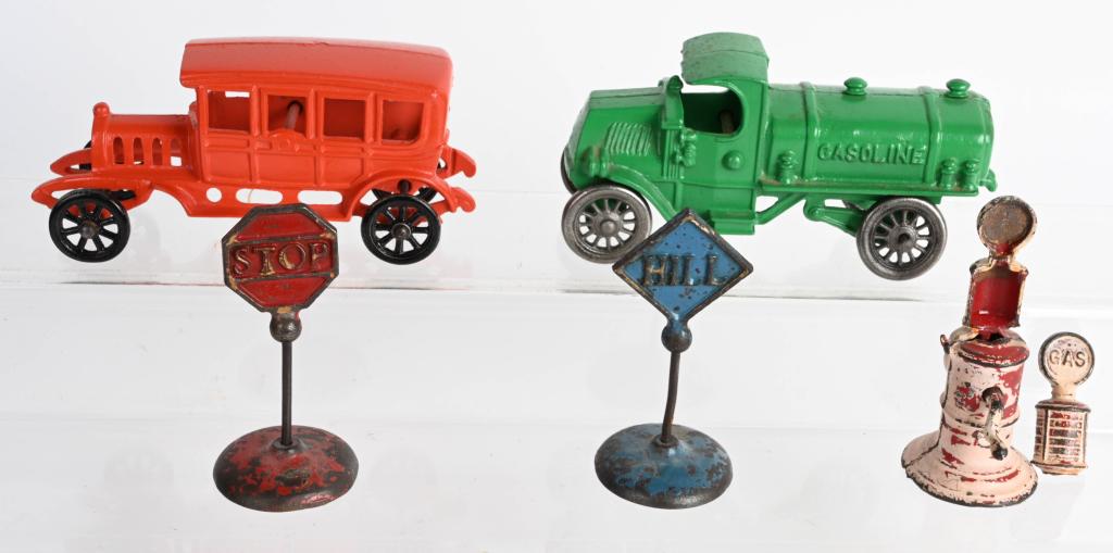2 CAST IRON CARS & SIGNS: Includes Restored cast Iron Gasoline Truck & Sedan. Plus Stop and Hill Signs all original. Bonus repainted Gas Pump. Largest 7"