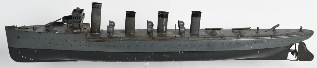 BING CLOCKWORK TORPEDO SHIP: Original Bing clockwork Torpedo Ship. All original condition. Clockwork is working. Has deck guns and some accessories on the deck. 2 smoke stacks are loose but present. Missing rail on one side. A gr